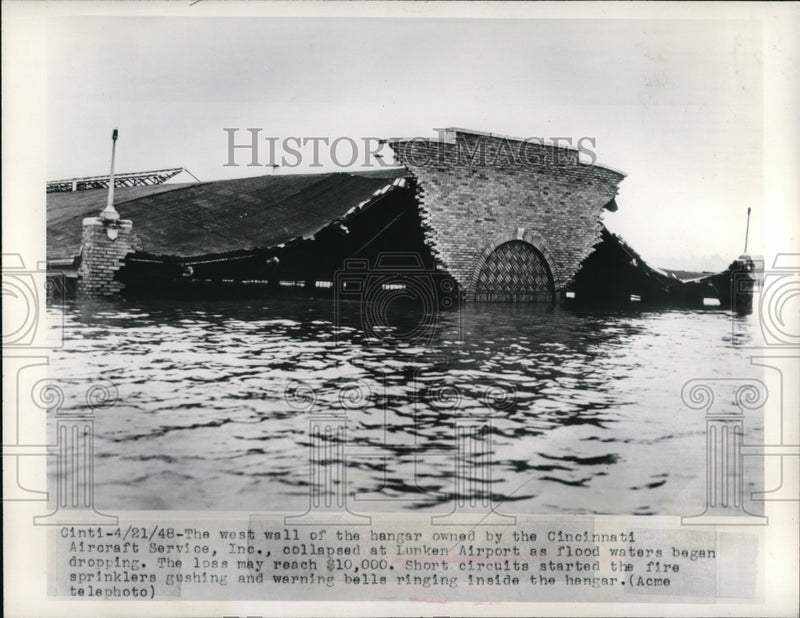 Load image into Gallery viewer, 1948 Press Photo A collapsed hangar wall at the Lunkin Airport owned by the
