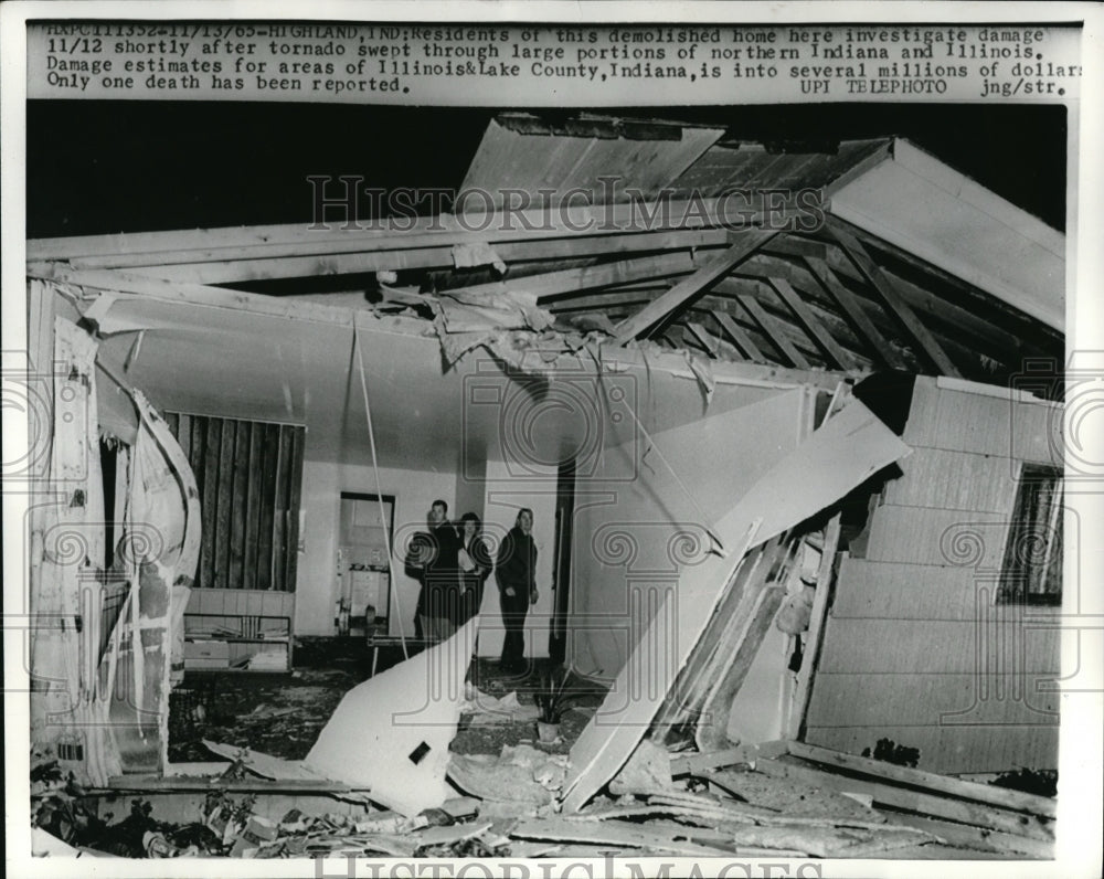 1963 Press Photo Residents survey the damage of their house ravaged by a tornado