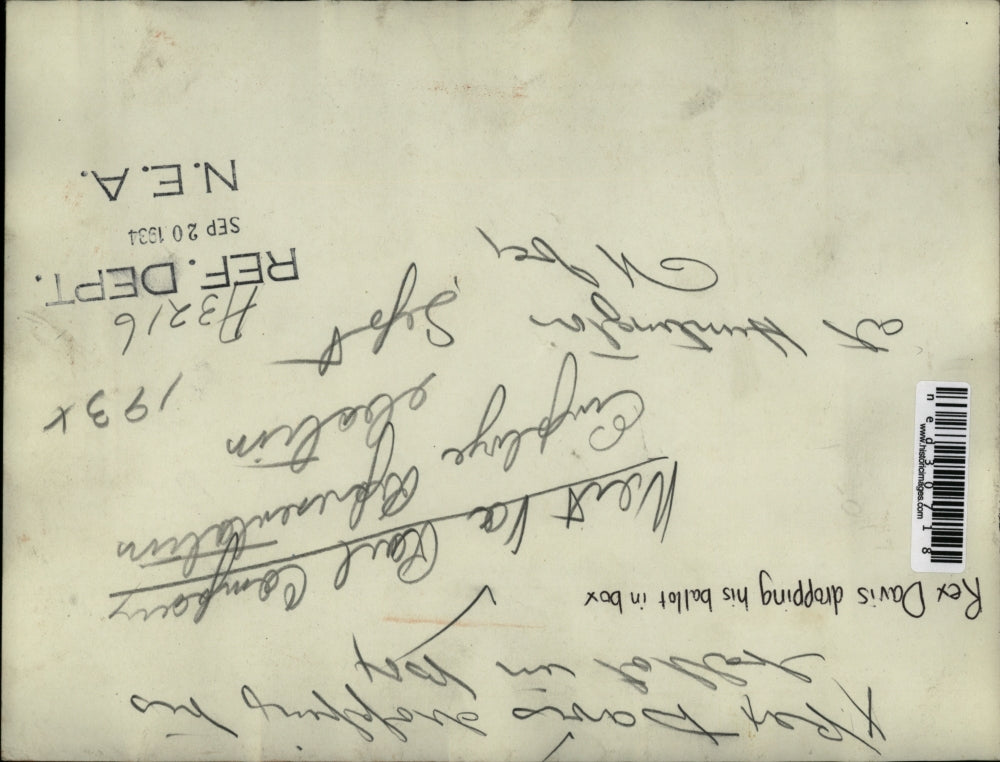 1934 Press Photo Rex Davis dropping his ballot in box at West Va. Rail Company