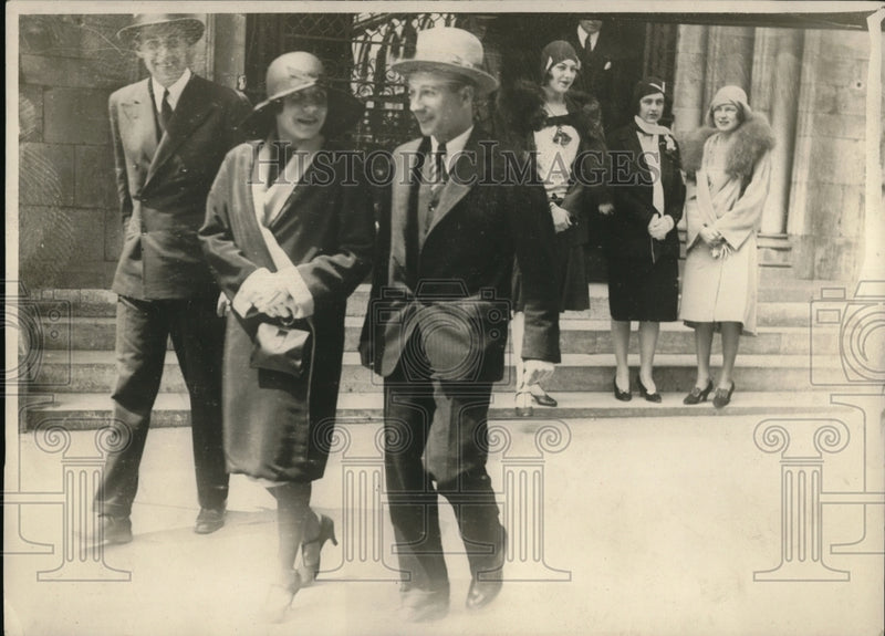 Load image into Gallery viewer, 1929 Press Photo Mr. A. Page ushers Miss A. Freeman after Fiske-Seymore wedding
