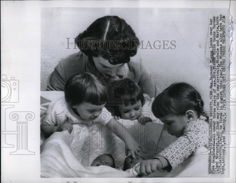 Load image into Gallery viewer, 1958 Press Photo Mrs. Rayond Miezwa with her newborn children

