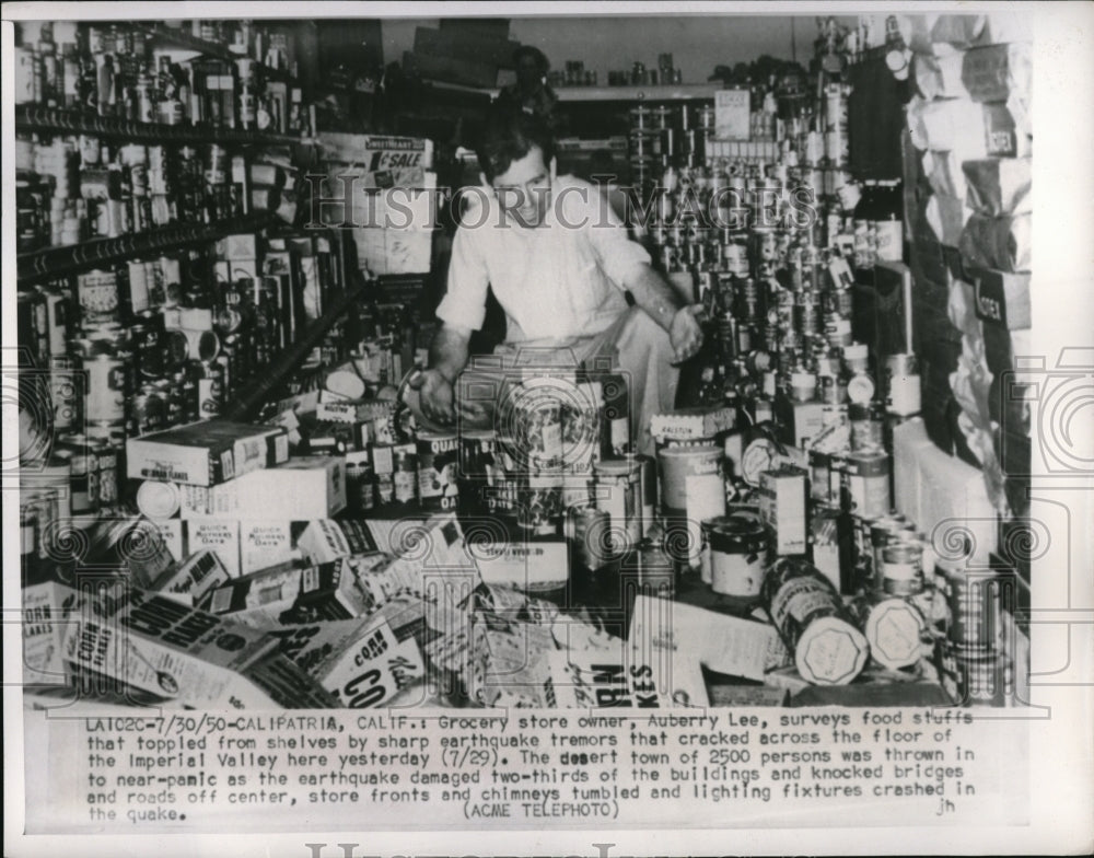 1950 Press Photo Grocery Store Owner Auberry Lee Surveying Earthquake Damage
