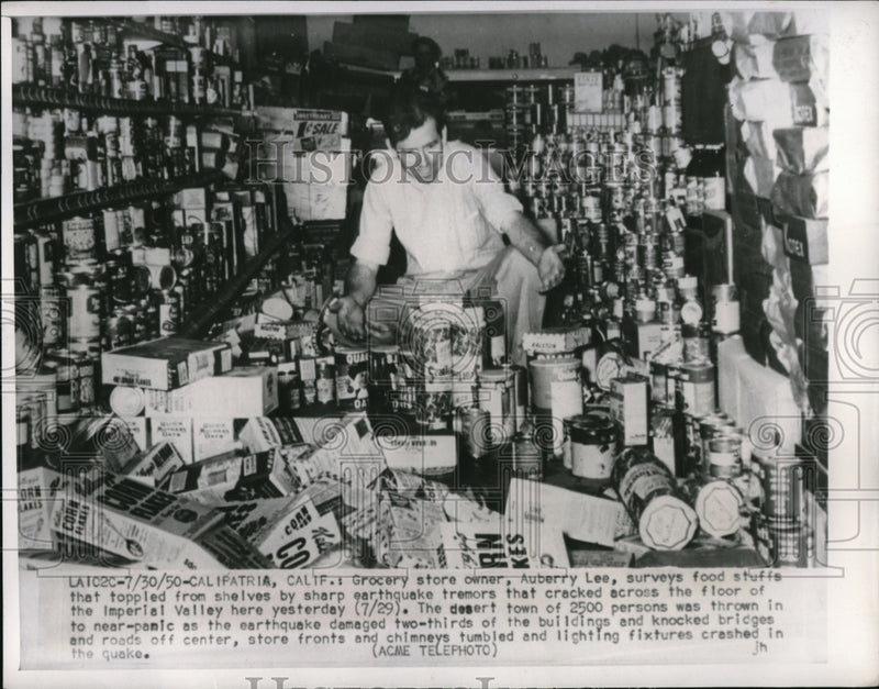 Load image into Gallery viewer, 1950 Press Photo Grocery Store Owner Auberry Lee Surveying Earthquake Damage
