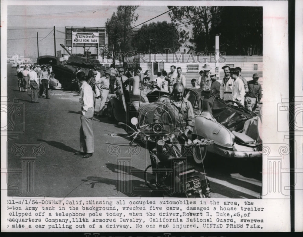 1954 Press Photo Tank Driver Robert B. Duke Causes Damage in Neighborhood