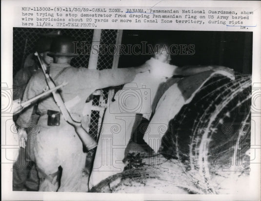 1959 Press Photo Panamanian National Guardsmen Stopping Demonstrator