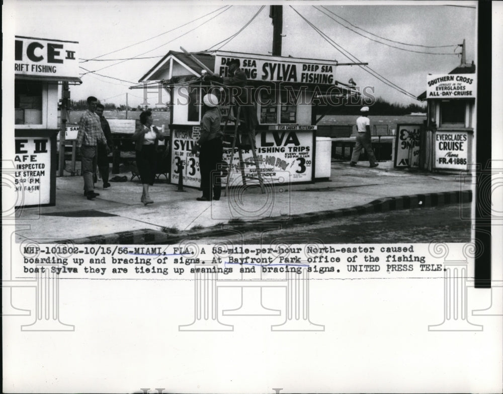 1956 Press Photo 55 Mile Per Hour North Easter Causes Boarding Up And Bracing