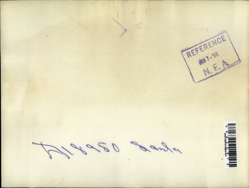 1957 Press Photo Giuseppe Canjoni Looking Over List of Rights As A Citizen