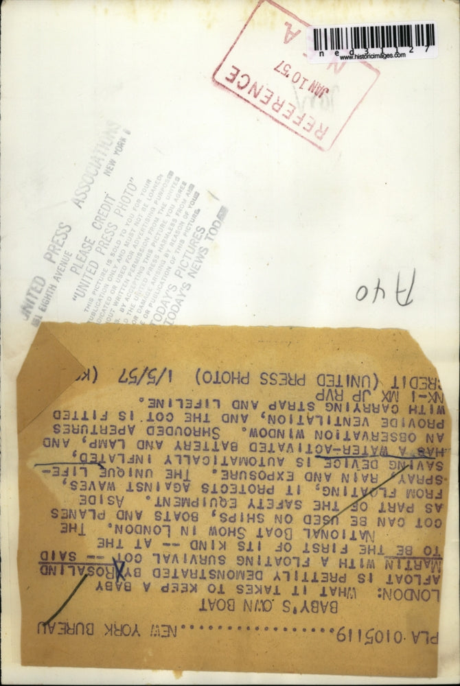 1957 Press Photo London what it takes to keep baby afloat is demonstrated by