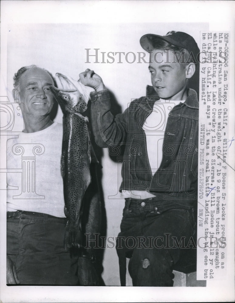 1958 Press Photo William F. Boone Sr. Looks Proudly At His Sons Trout