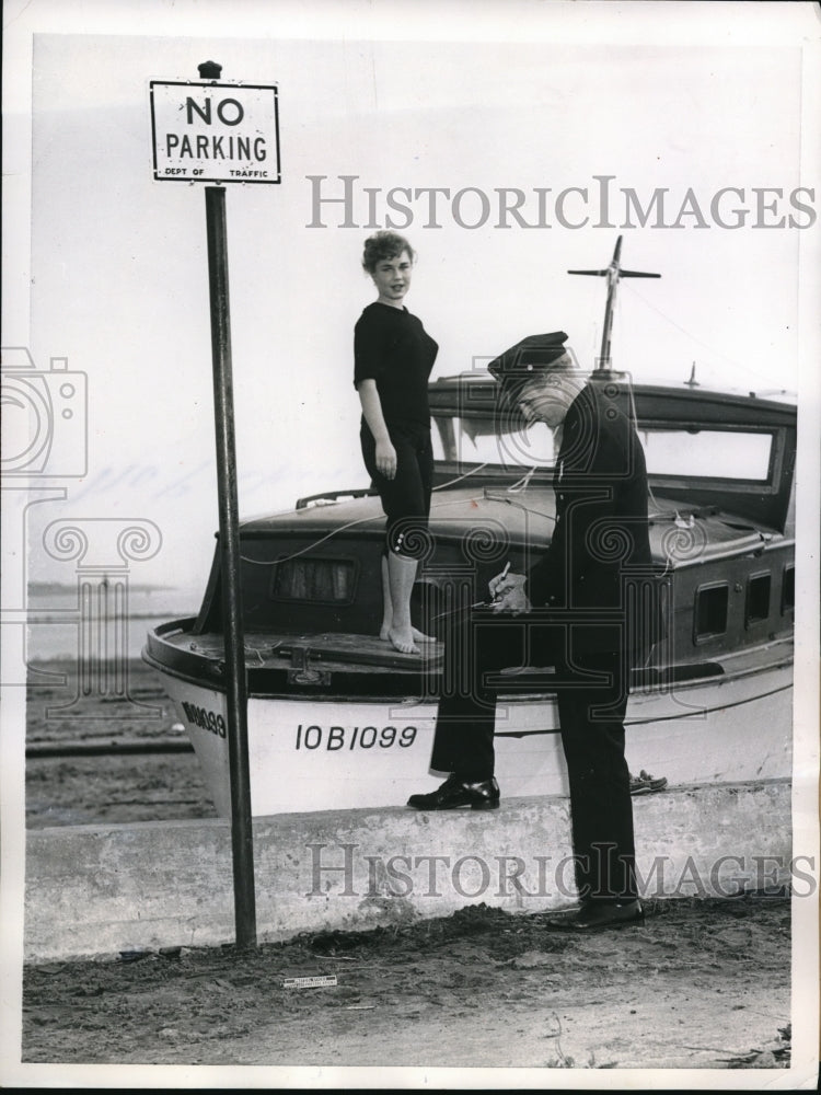 Load image into Gallery viewer, 1955 Press Photo Staten Island NY looks as if Pat Perwood is getting a ticket
