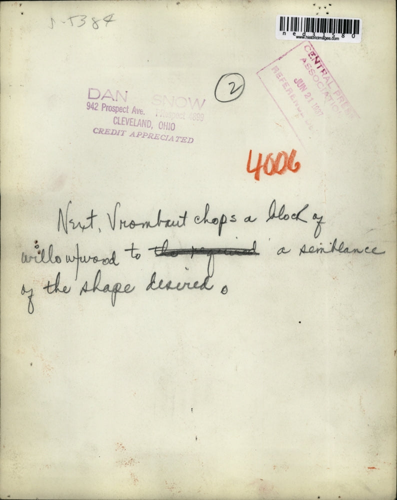 1937 Press Photo Next Vrombaut chops a block of willow wood to the shape desired