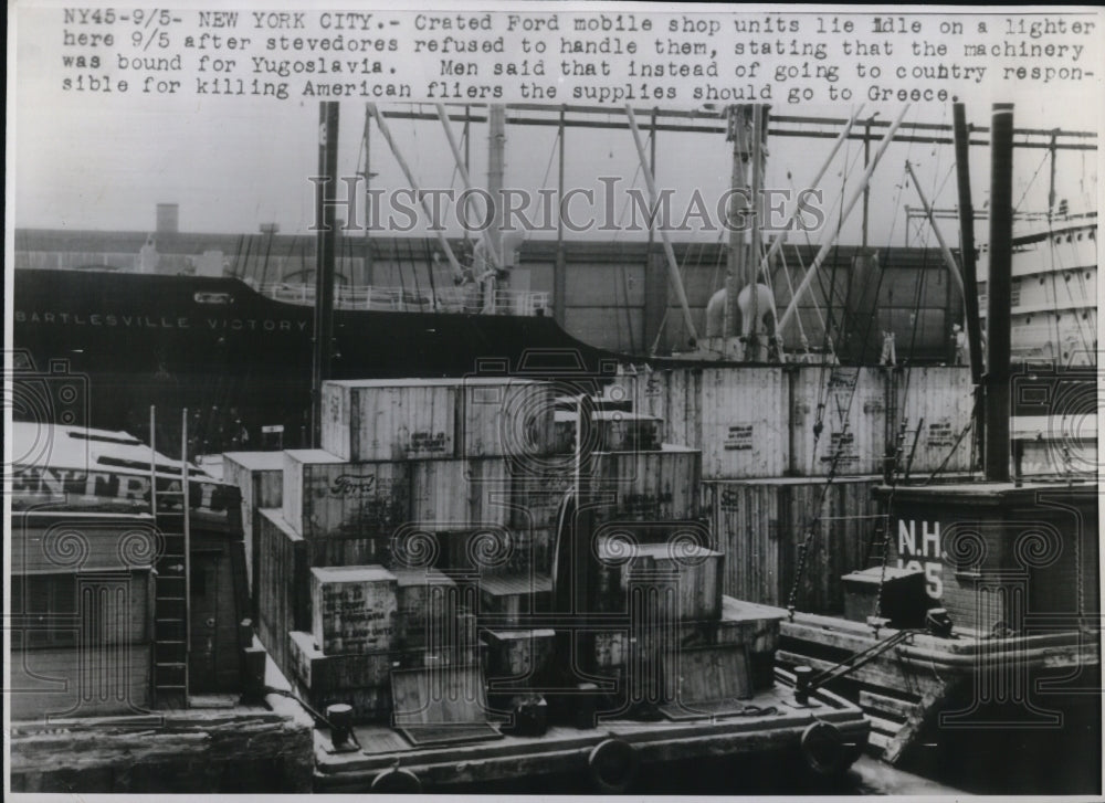 1946 Press Photo Crated Ford mobile shop units lie idle on a lighter