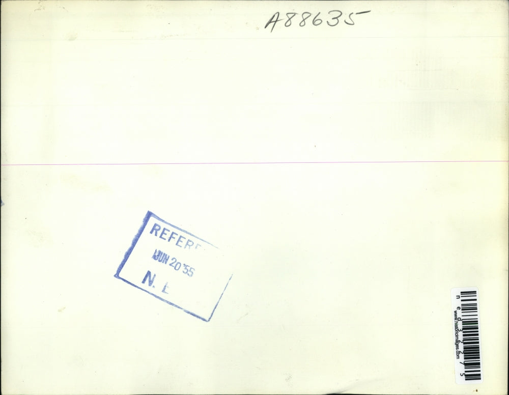 1955 Press Photo Charged in the theft of $11,000 are on their way to police car