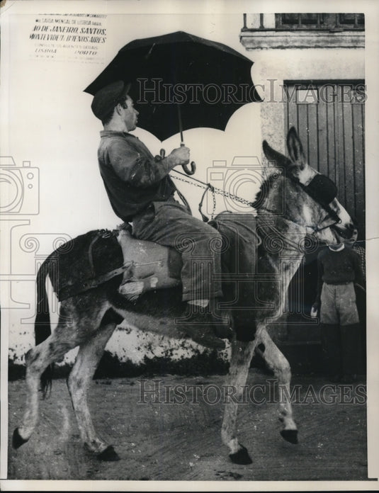 1957 Press Photo Proud portugeese farm workers with convertibles