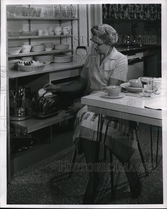 1956 Press Photo Dish cabinet is conveniently located for setting table and