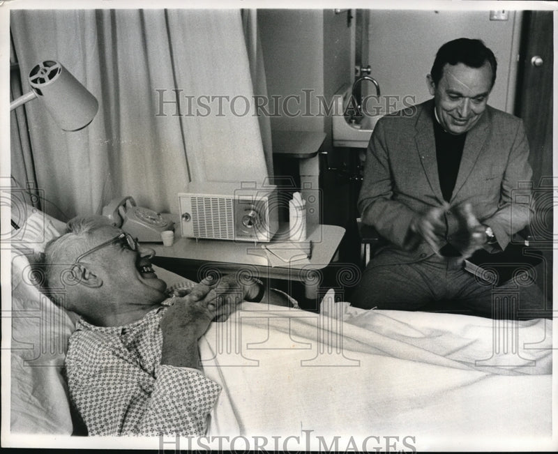 Load image into Gallery viewer, 1963 Press Photo Rev Carl E Ericson visits Elder Wayne McAfee recovering from

