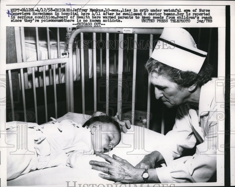 Load image into Gallery viewer, 1958 Press Photo Jeffrey Mankus lies in crib as Genevieve Herschman watches
