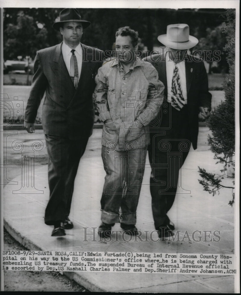 Load image into Gallery viewer, 1951 Press Photo Edwin Furtado being led to US Commissioner's office
