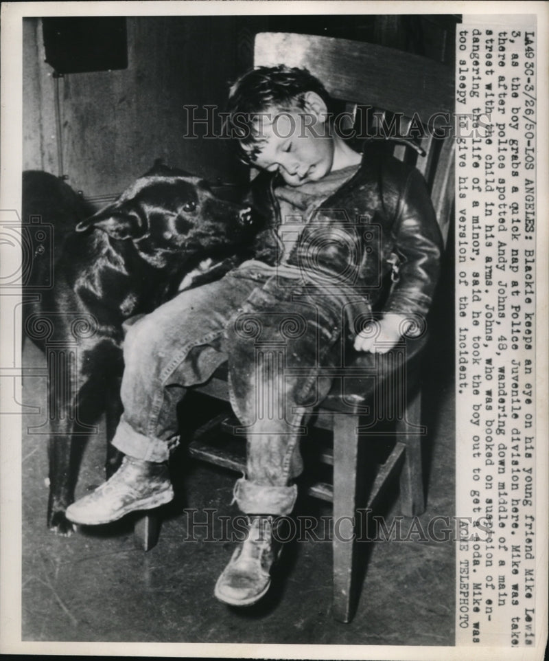 Load image into Gallery viewer, 1950 Press Photo Blackie keeps eye on Mike Lewis who takes a quick nap
