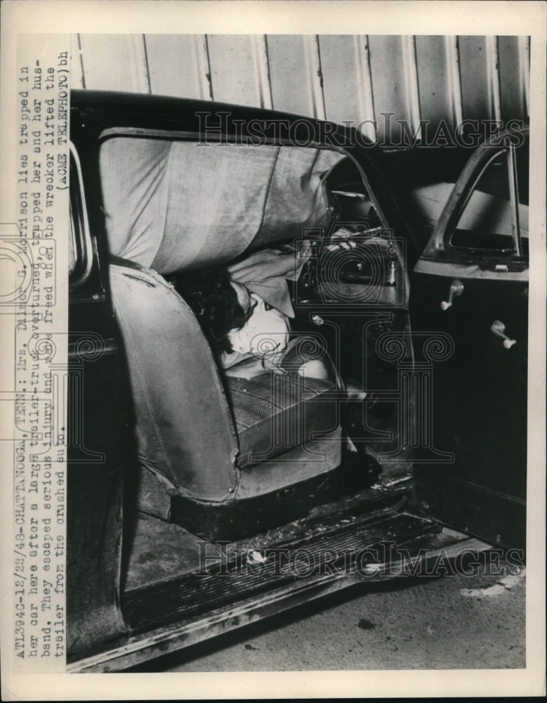 1948 Press Photo Mrs. Dilmer G. Morrison lies trapped in car after accident- Historic Images