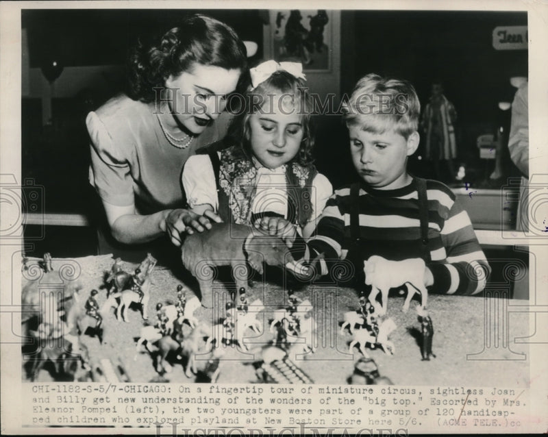 Load image into Gallery viewer, 1948 Press Photo Joan &amp; Billy guided by Eleanor Pompei at playland in store
