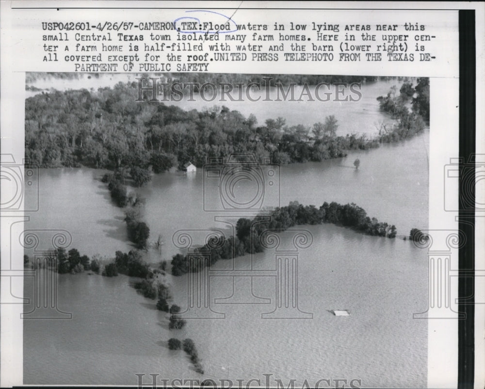 1957 Press Photo Flood waters im loe areas near small central Texas town