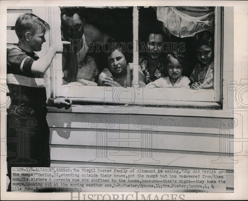 Load image into Gallery viewer, 1951 Press Photo Virgil Foster family inside as Merlin, gets mumps, is outside
