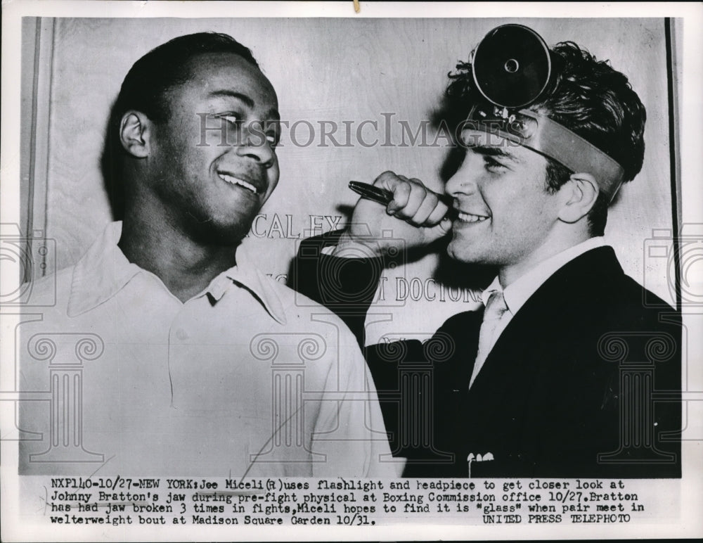 Press Photo Joe Miceli and Johnny Bratton during pre-fight physical