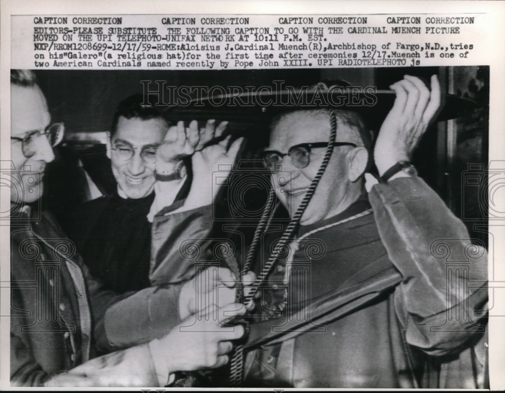 1959 Press Photo A.J.C. Muench, Archbishop of Fargo, tries on "Galero"
