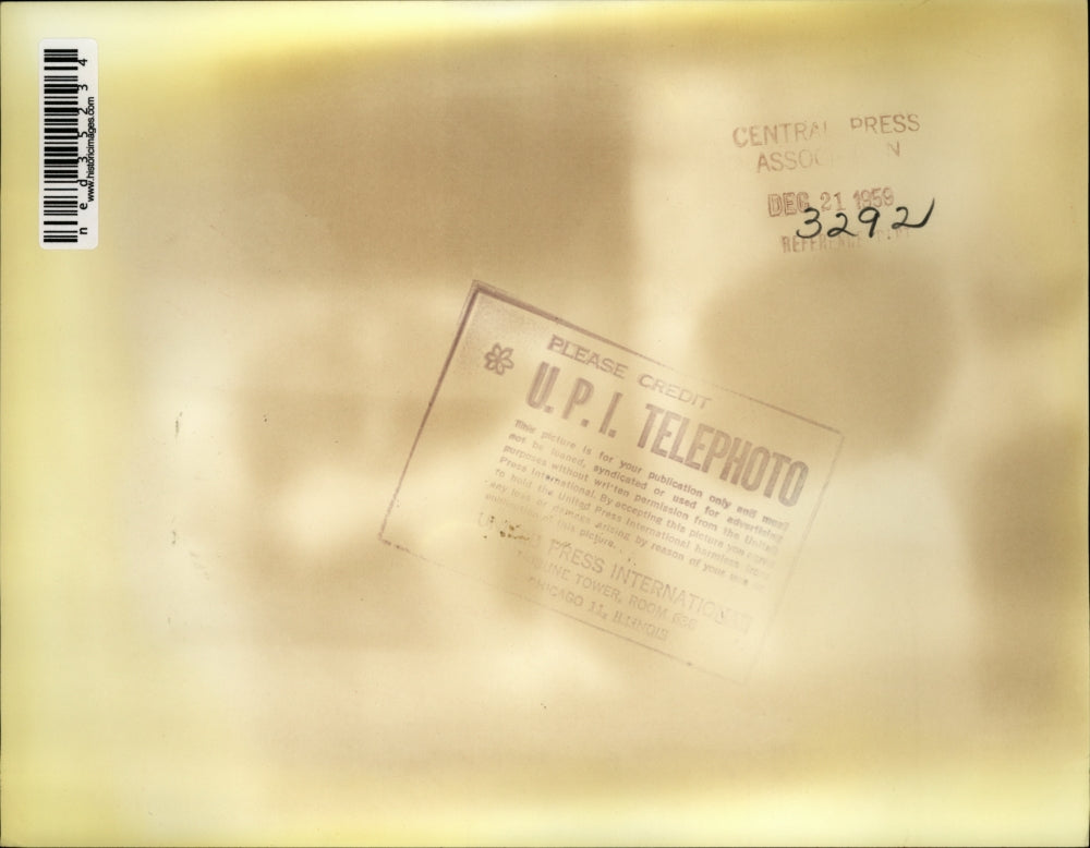 1959 Press Photo A.J.C. Muench, Archbishop of Fargo, tries on "Galero"