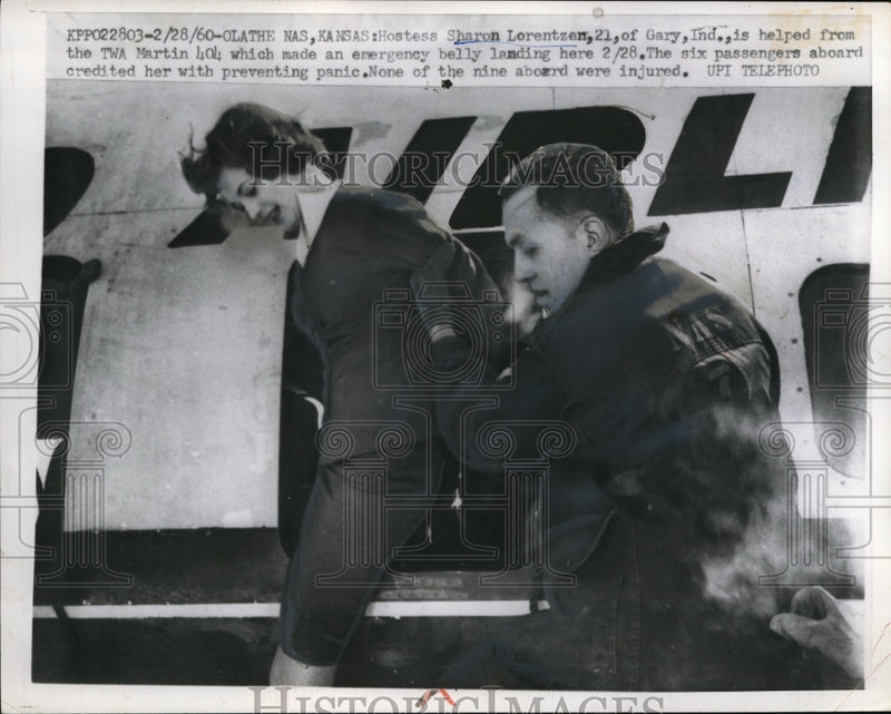 Load image into Gallery viewer, 1960 Press Photo Olathe Kansas Hostess Sharon Lorentsen is helped from the TWA
