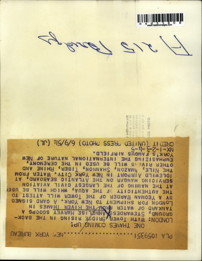 1954 Press Photo Annelise Harvey scoops a tankard of water from the river Thames