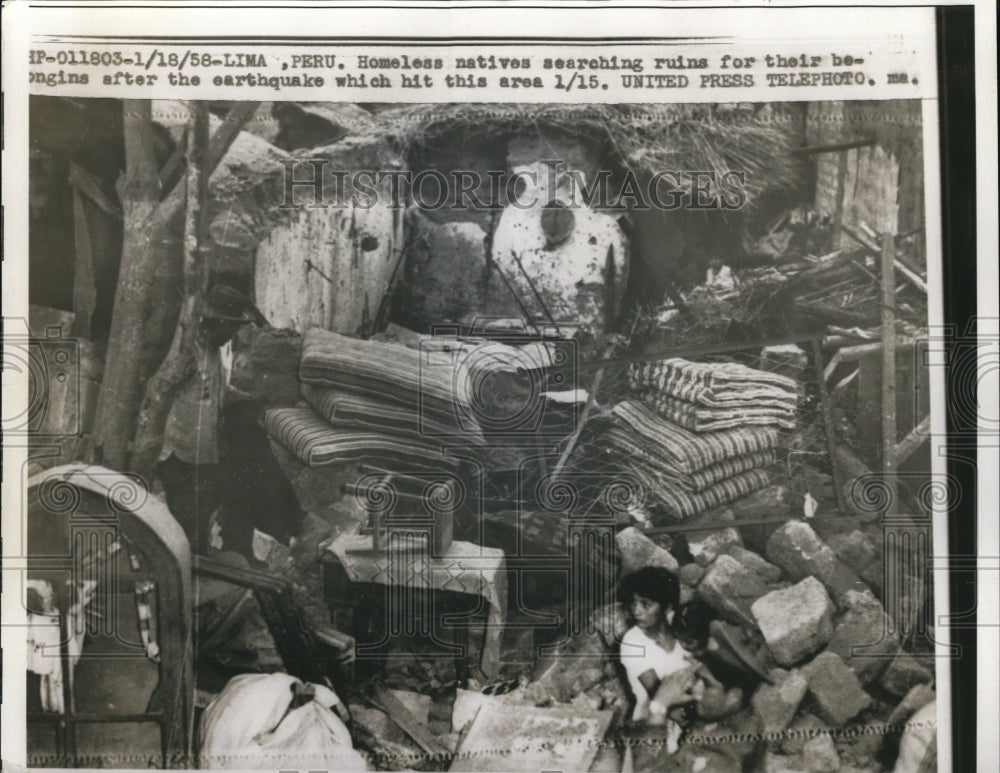 1958 Press Photo Homeless natives searching for their belongings after an