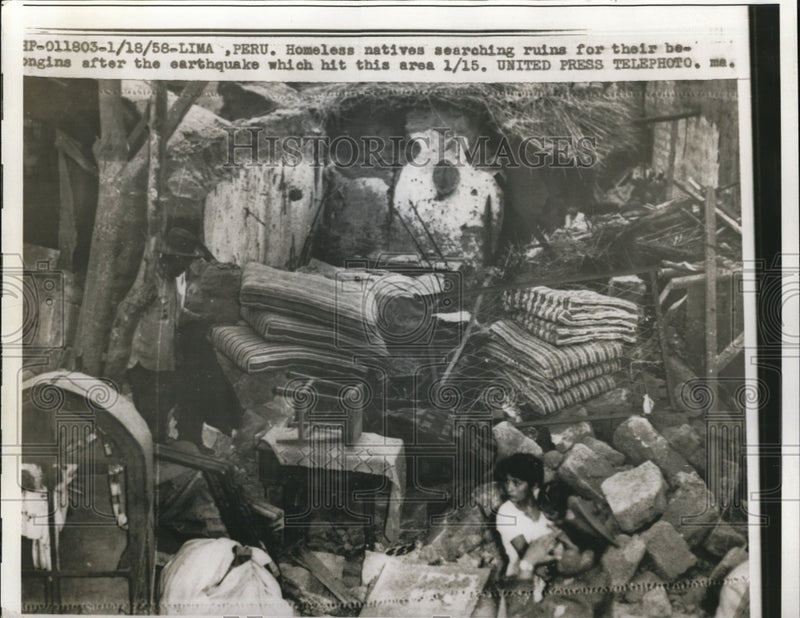 Load image into Gallery viewer, 1958 Press Photo Homeless natives searching for their belongings after an
