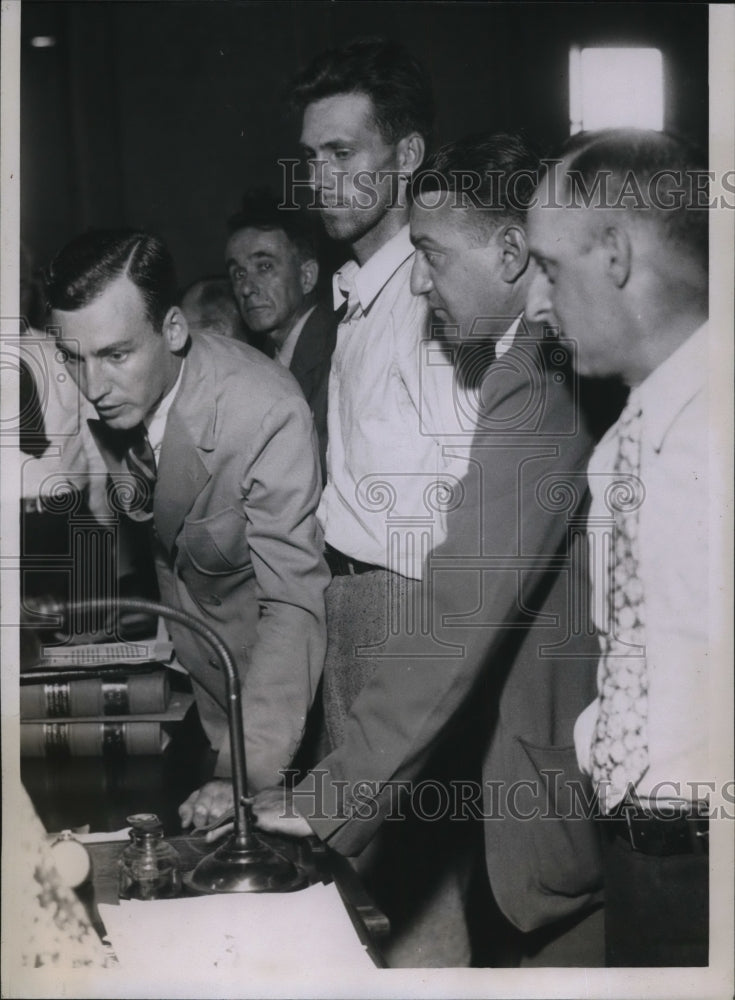 Load image into Gallery viewer, 1935 Press Photo Photo shows Mandeville Zenge as a warrant was issued charging
