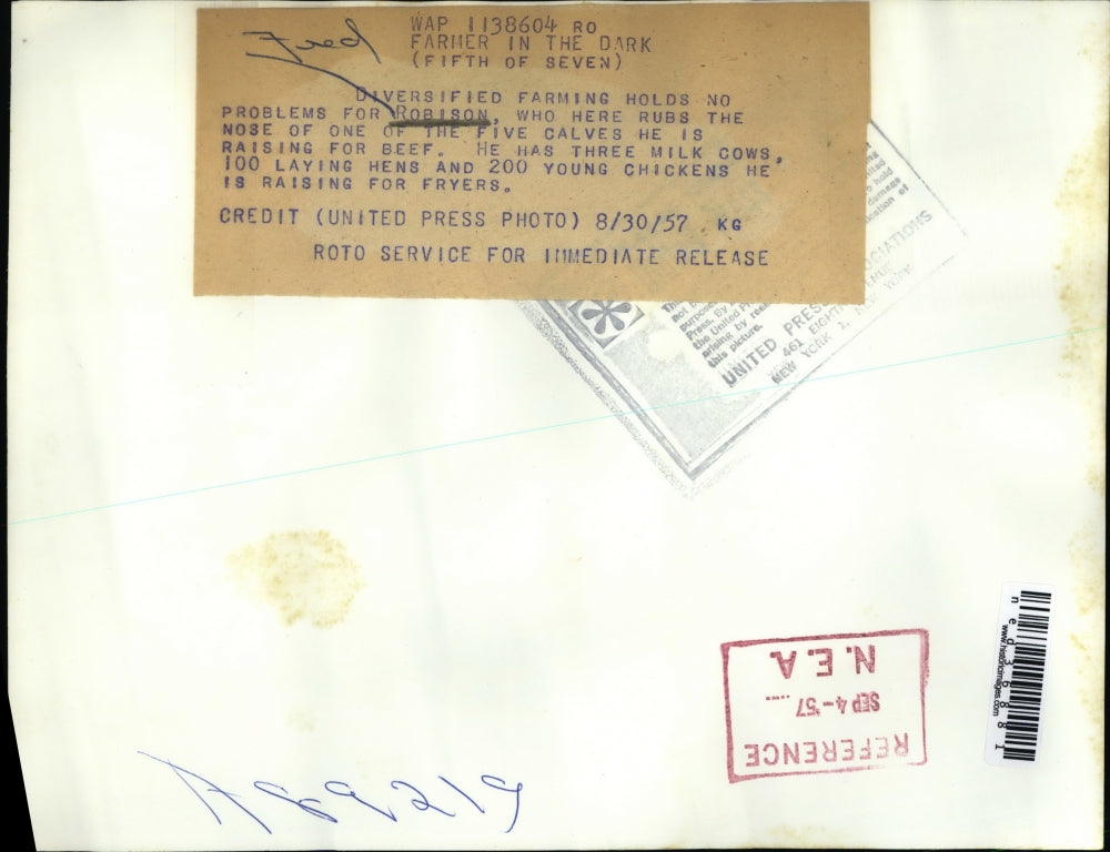 1957 Press Photo Farmer in the Dark