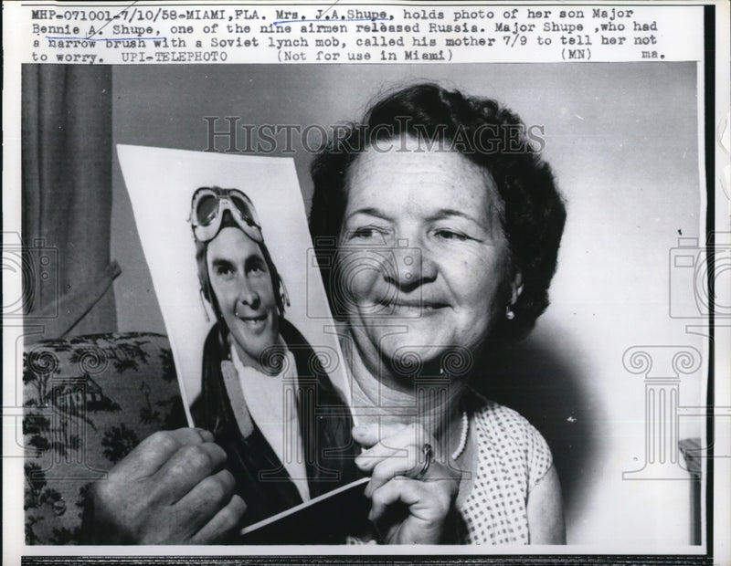 Load image into Gallery viewer, 1958 Press Photo Mrs. J.A. Shupe holds a photo of her son Major Bennie A. Shupe

