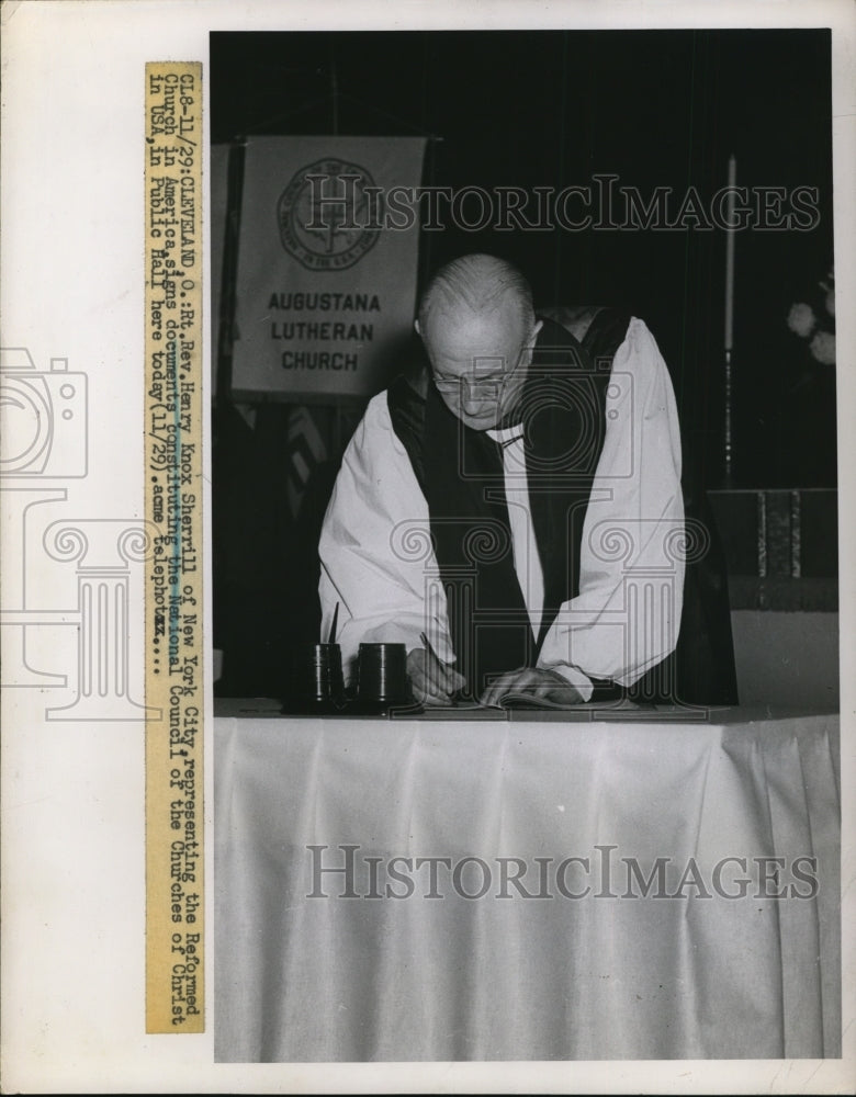 1951 Press Photo Henry Knox Sherrill Signs Documents In Cleveland Public Hall