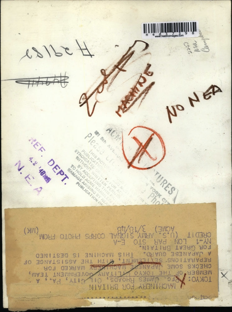 1948 Press Photo Pfc. James Rhoads Checks Machinery in Tokyo - ned37398