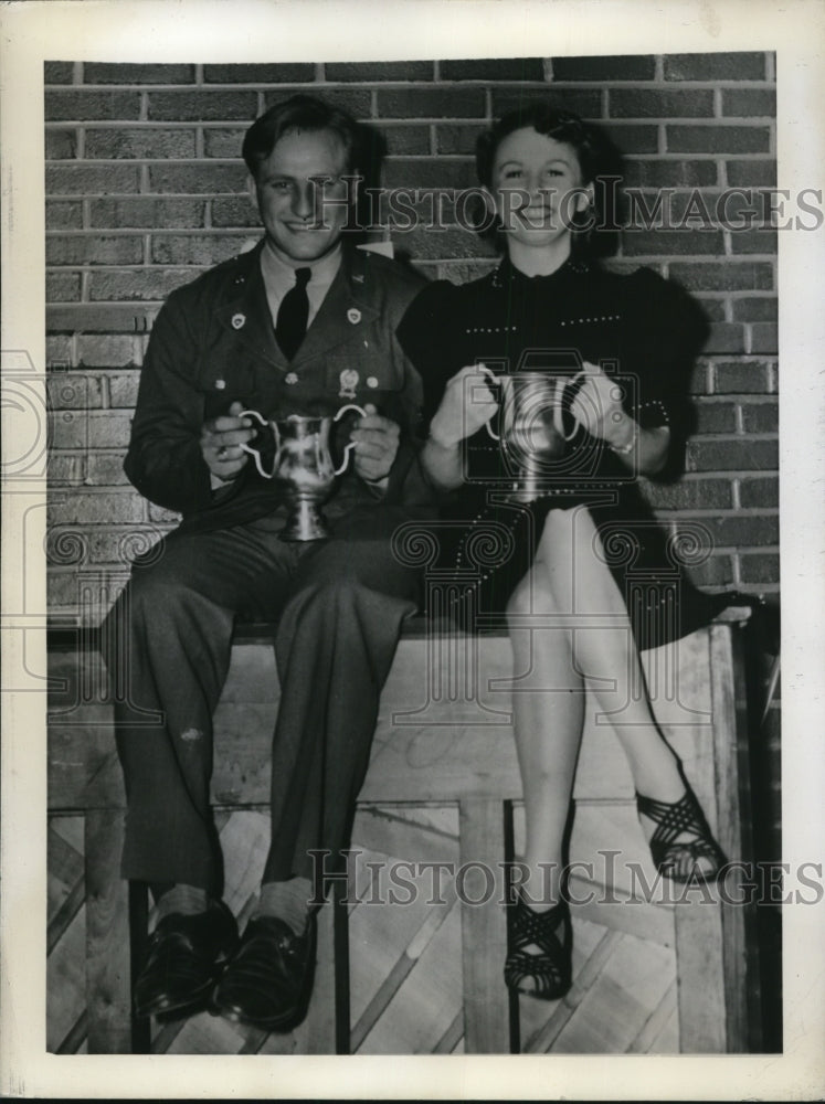 Load image into Gallery viewer, 1941 Press Photo Fred Astaire &amp; Rita Hayworth Donated Silver Loving Cups
