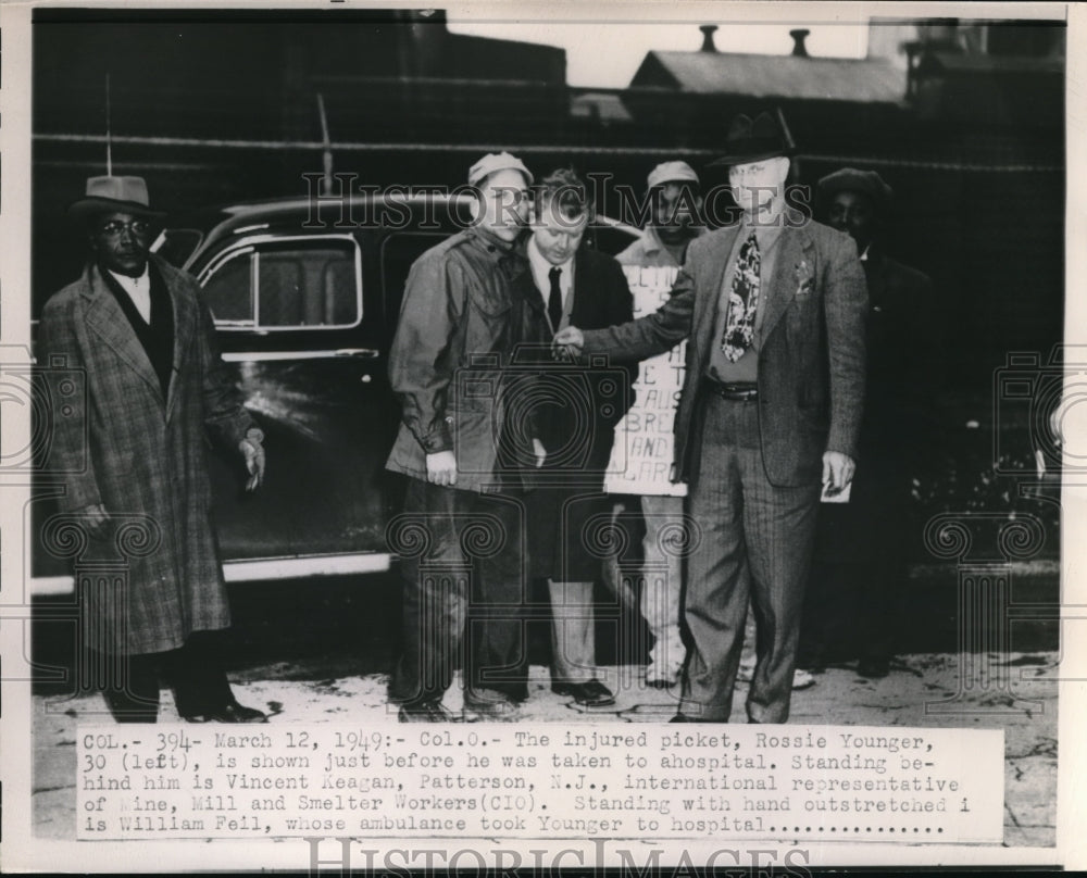 1949 Press Photo Rossie Younger is shown just before he was taken to a hospital