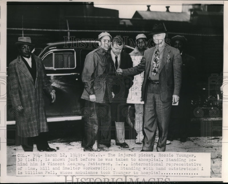 Load image into Gallery viewer, 1949 Press Photo Rossie Younger is shown just before he was taken to a hospital
