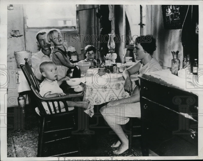 Load image into Gallery viewer, 1934 Press Photo Photo shows a scene typical of the living conditions in this
