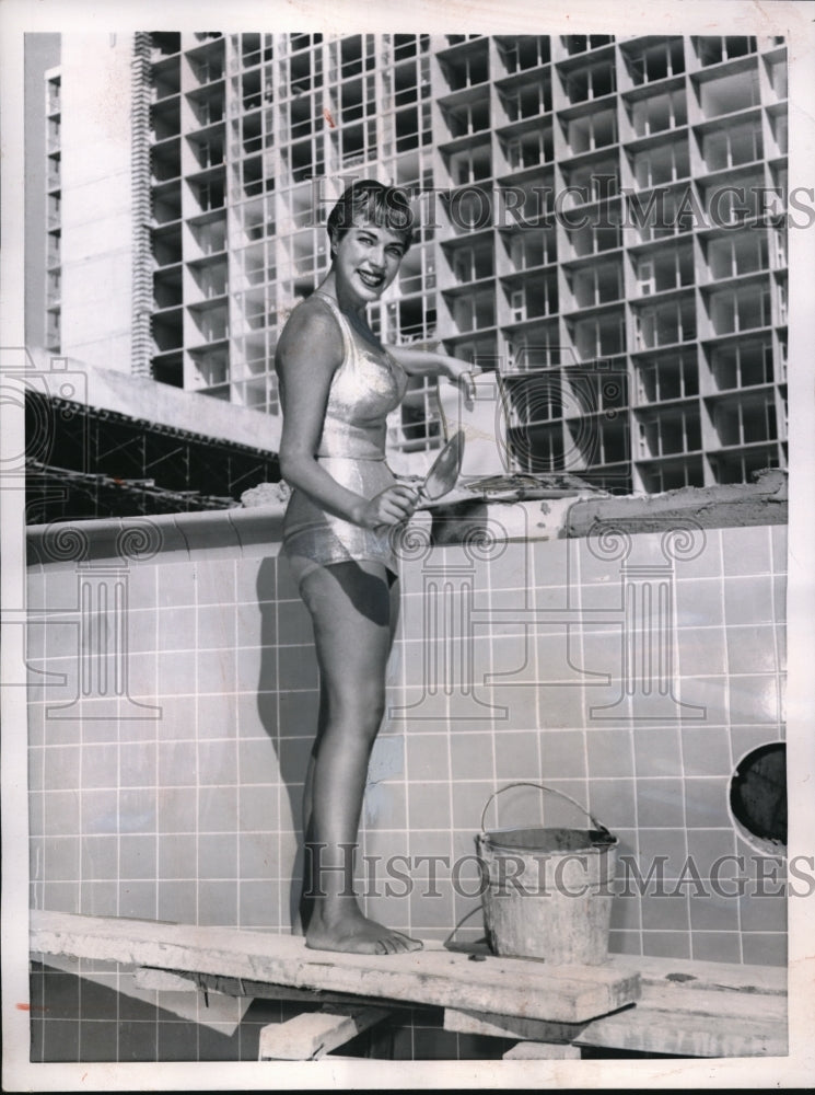Load image into Gallery viewer, 1957 Press Photo Miami Beach Fla prettiest bricklayer is noted swimming
