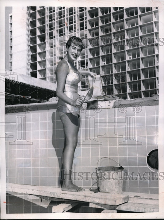 1957 Press Photo Miami Beach Fla prettiest bricklayer is noted swimming