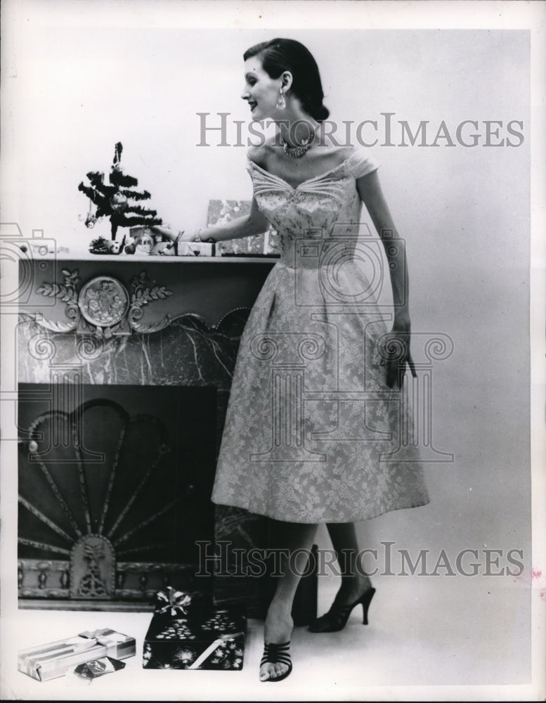 1955 Press Photo French lace over pale pink satin for the Holidays