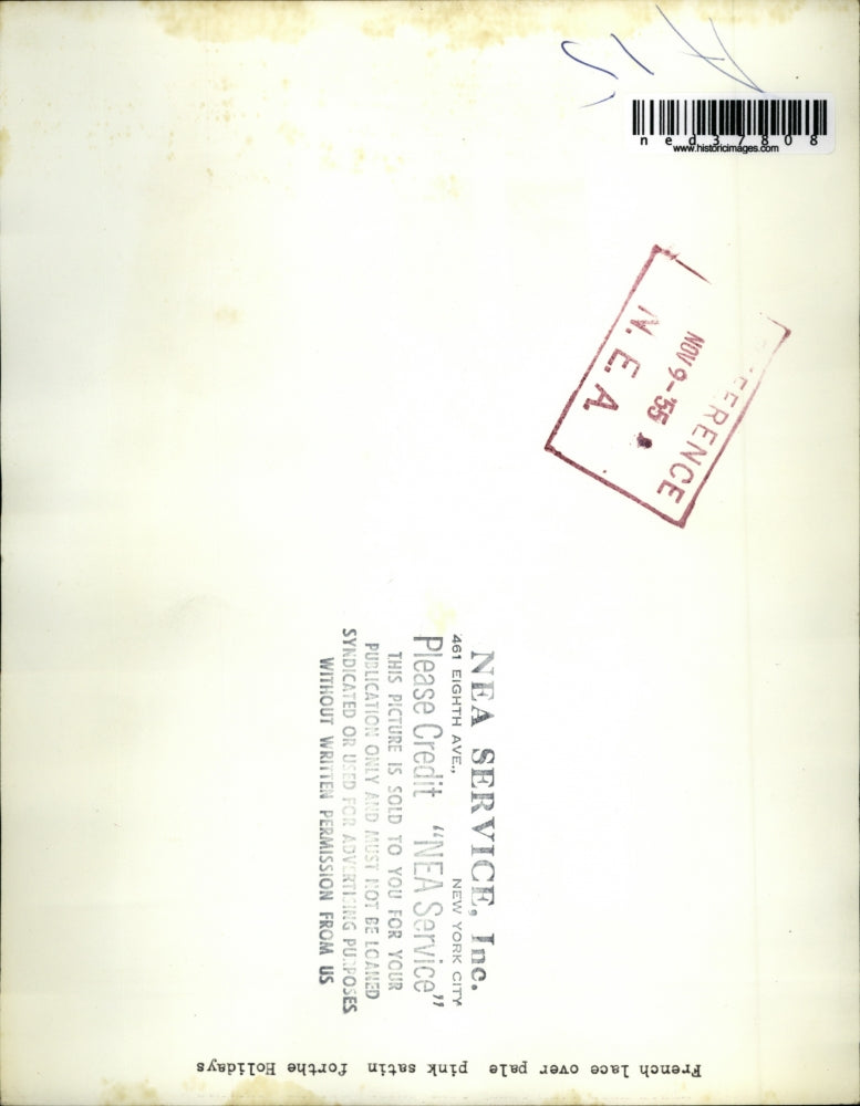 1955 Press Photo French lace over pale pink satin for the Holidays