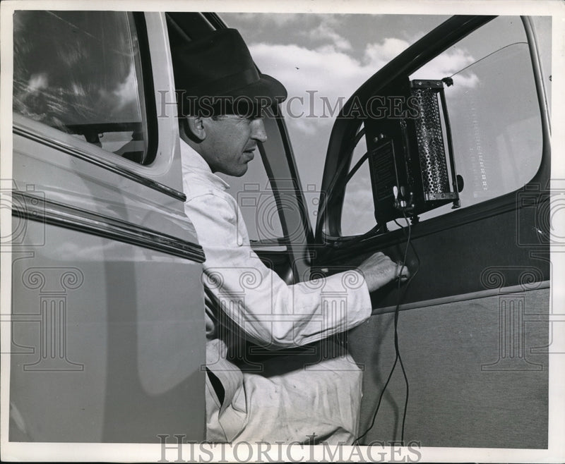 Load image into Gallery viewer, 1946 Press Photo Bob Mallow studies the indicated test run of
