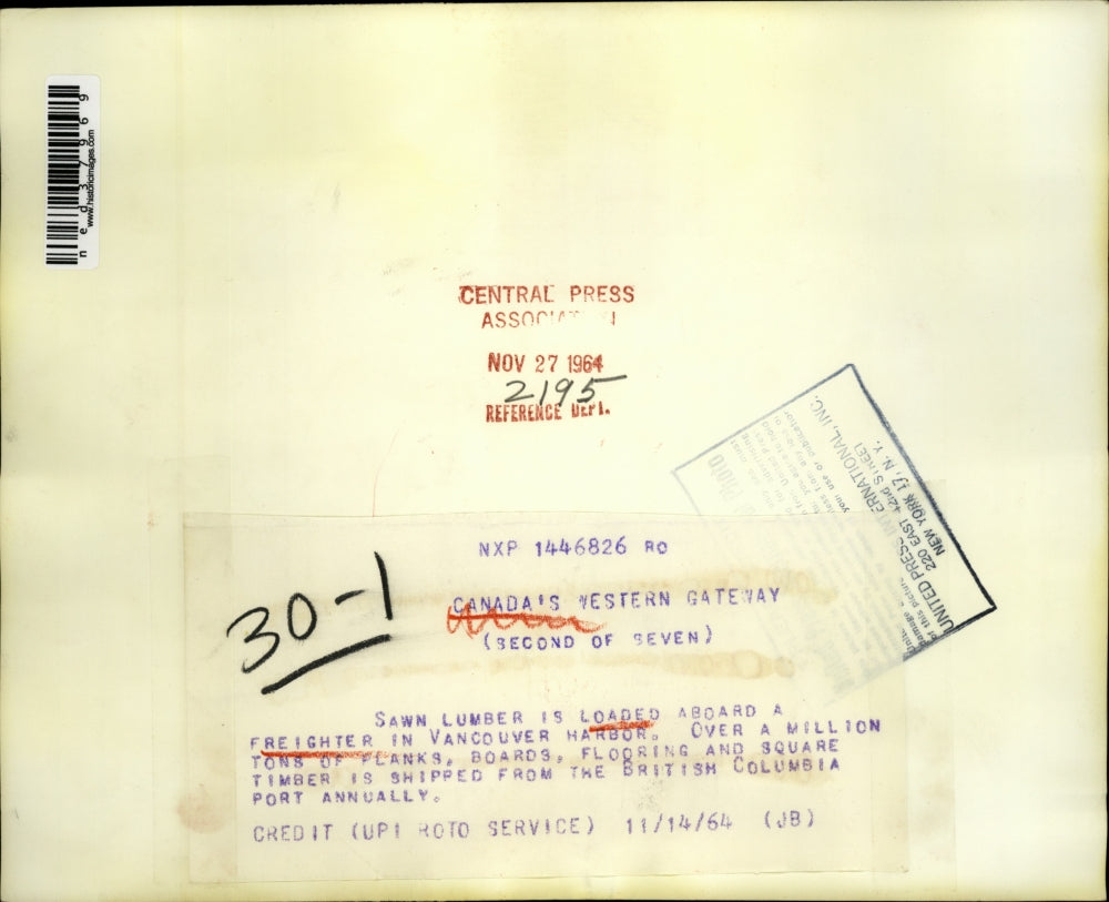 1964 Press Photo Sawn lumber is loaded aboard a freighter in Vancouver,