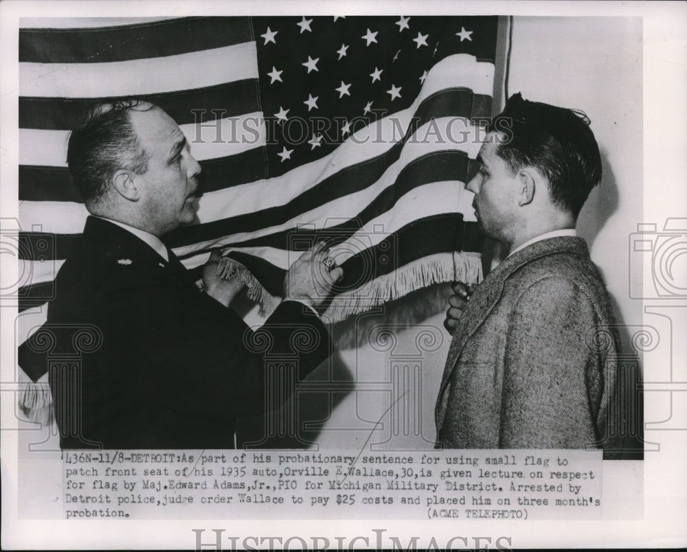 1951 Press Photo Orville E. Wallace Is Given Lecture On Respect For Flag